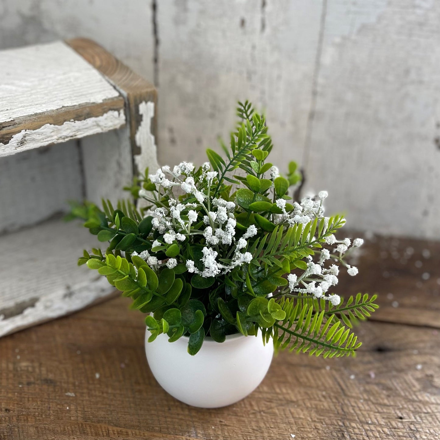 White Flowers in White Ceramic Pot