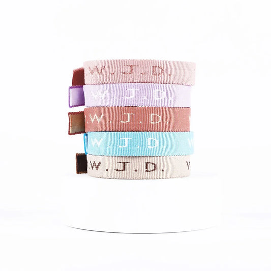 WWJD Woven Assorted Light Color Bracelet